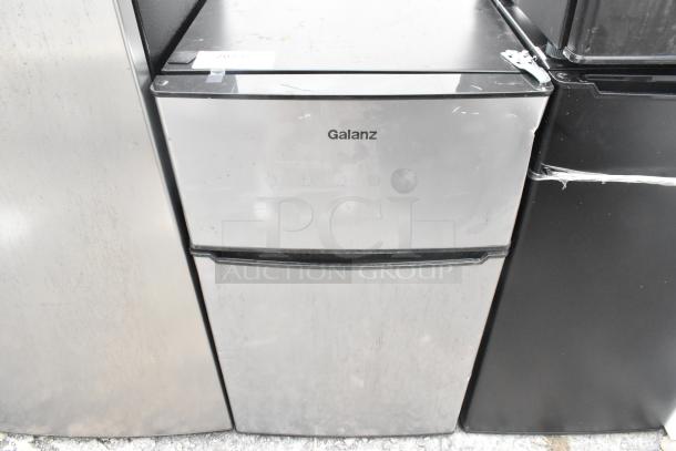 Galanz GLR31TSTE02 Mini Cooler with Freezer, stainless steel finish, 115 Volts, 1 Phase, slight surface wear.