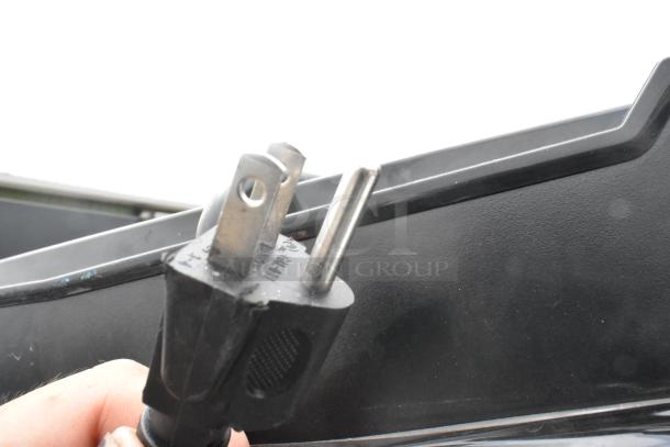 Galanz GLR31TSTE02 Mini Cooler power cord and plug, 115 volts, 1 phase. Visible markings on plug for electrical specifications.