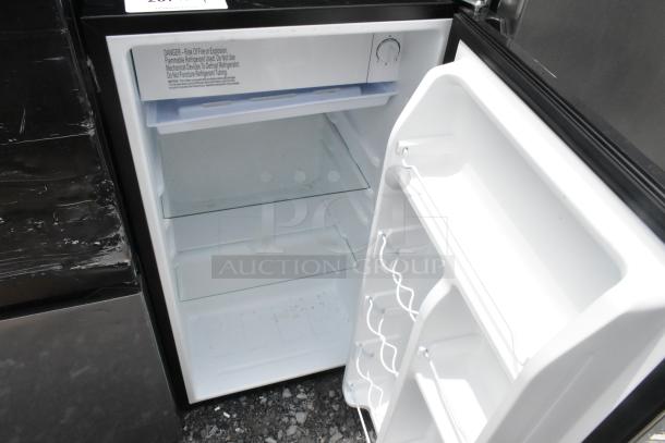 Galanz GLR33MS1E02 mini cooler; open showing interior with glass shelves and door racks. 115 Volts, 1 Phase.