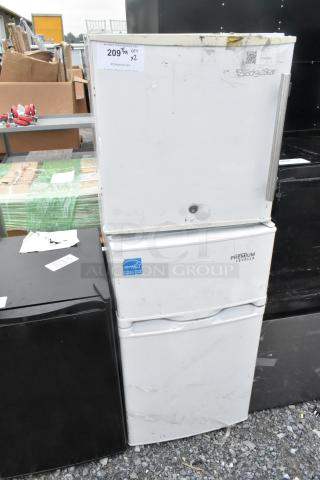 Two mini coolers, brands EdgeStar and Premium Levella, white, 115 volts, 1 phase, visible scratches, Energy Star label.