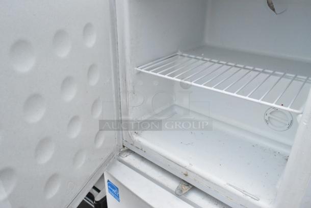 Two mini coolers, brands EdgeStar and Premium, 115V, 1 phase. Includes cooling dial and wire shelf. Signs of use.