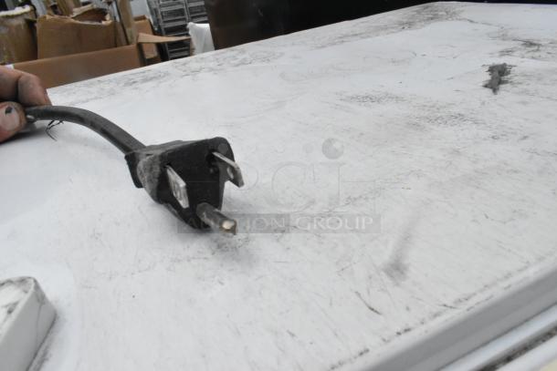 Two mini coolers by EdgeStar and Premium, 115 volts, one phase, showing power plug. Sold in set, scratch marks visible.
