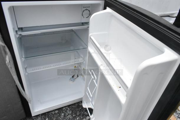 Mini cooler, 115 volts, 1 phase, with glass shelf. White interior, open door, temperature control knob visible.