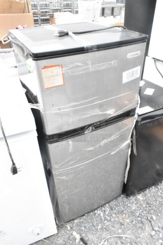 Vissani HVDR430SE Mini Cooler with Freezer, stainless steel finish, 115 Volts, 1 Phase, moderately used, model label visible.