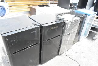 Four mini coolers including AccuCold ARG3PV, Nostalgia IRF32BK, Haier HC32TW10SB, Black & Decker BCD33B. 120V, used condition.