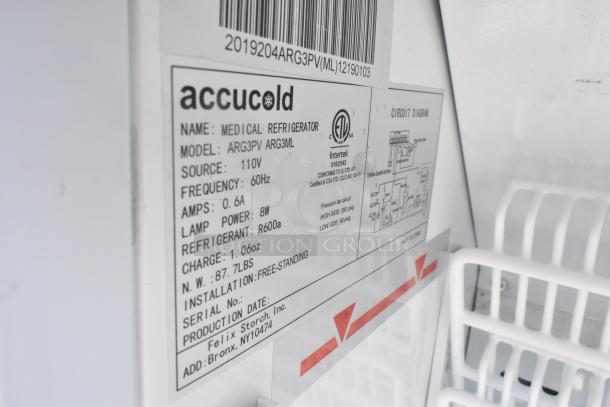 AccuCold ARG3PV mini cooler label showing model details, voltage, and specifications. Used for medical refrigeration.