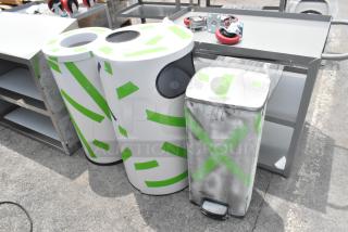 Three assorted trash can shells in various shapes, wrapped in green tape. Condition appears new, three per bid.