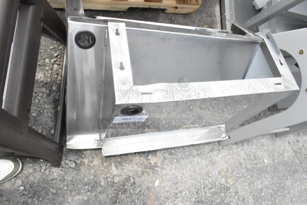 Stainless steel wall mount shelf, brand new condition with minor scratches. Ideal for kitchens or garages.