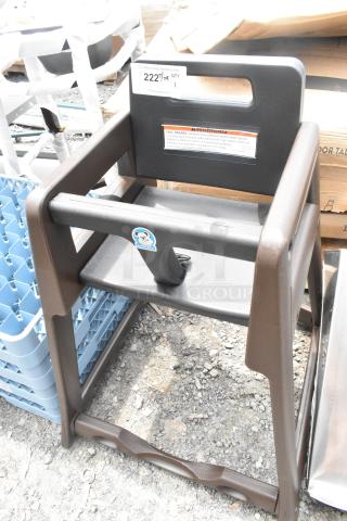 Brown Koala Kare high chair, brand new with minor scratches and dents. Features warning label and Koala Kare logo.