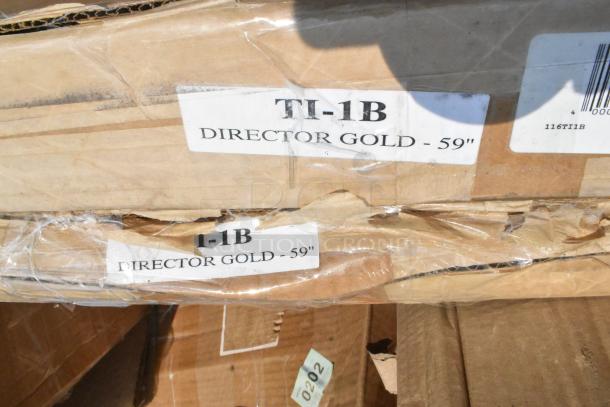 Cardboard boxes with labels "TI-1B Director Gold - 59”." Boxes show signs of wear; part of a scratch and dent auction lot.