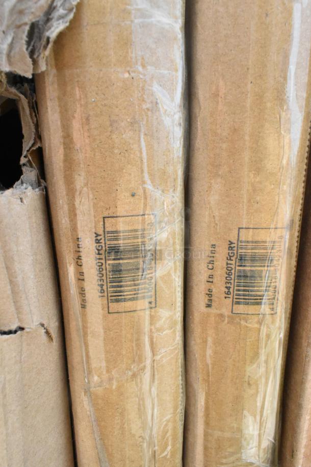 Cardboard boxes containing 12 brand new scratch and dent items; "Made in China" and barcode visible.