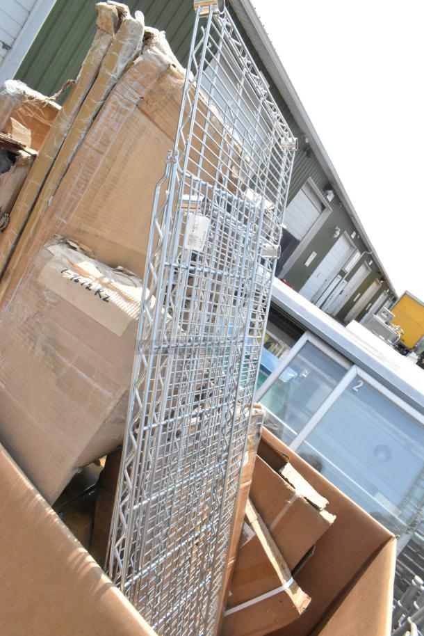 12 new scratch-and-dent items, including tabletops, stainless steel tables, Metro shelves, in original packaging.