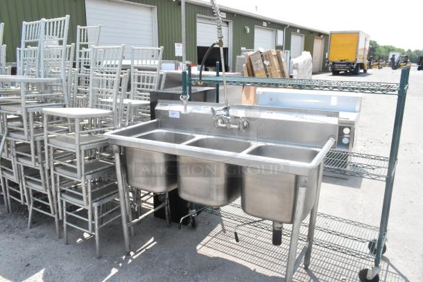 Eagle Stainless Steel 3 bay sink with faucet and handles, visible label, durable condition, ideal for commercial use.