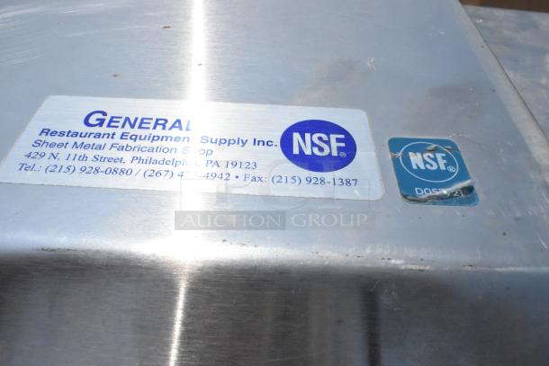 5' stainless steel grease hood with filters and light, NSF certified. Manufacturer label: General Restaurant Equipment Supply Inc.
