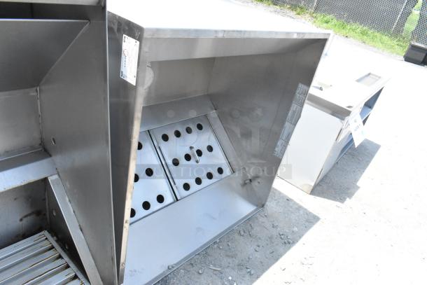 4' CaptiveAire 4830 ND-2 stainless steel grease hood with filters, featuring visible labels and sturdy construction.