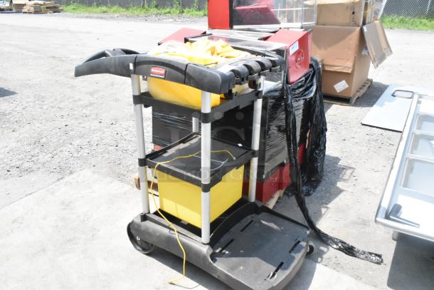 Rubbermaid Poly Janitor Cart with bag holder and shelves, black and yellow, good condition, visible branding.