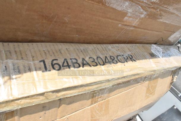 Cardboard boxes labeled "164BA3048CPR," part of a lot including a bin, canopy, and table, new scratch and dent items.