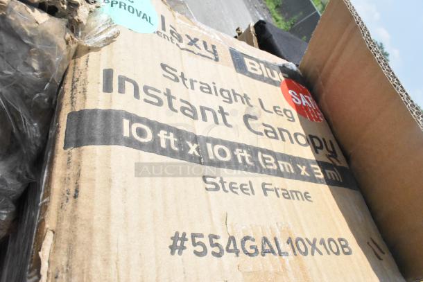 Cardboard box labeled "Straight Leg Instant Canopy, 10 ft x 10 ft, Steel Frame, #554GAL10X10B." Box shows wear.