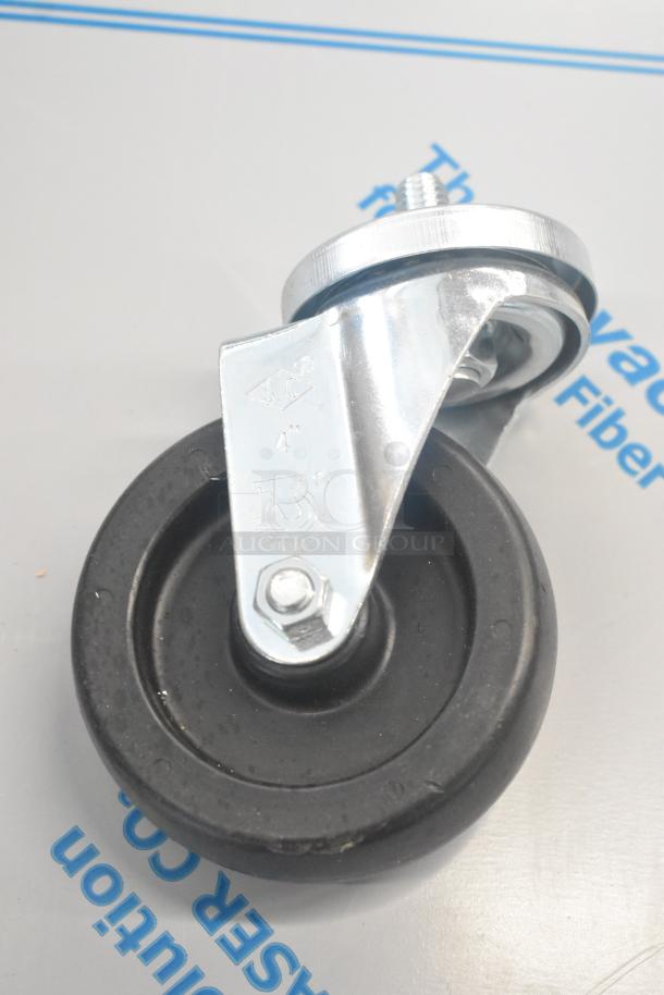 Lot of commercial casters, metal bracket, black rubber wheels, new condition, includes additional hose.