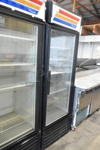 True GDM-23F metal commercial cooler, single glass door, poly-coated racks, 115 volts, 1 phase, excellent condition.
