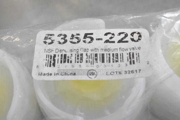 Package of 5355-220 Poly Condiment Bottle Lids, NSF certified, medium flow valve, made in China, Lot# 32617.