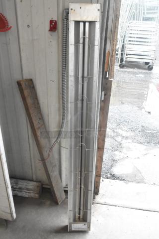 Hatco GRAH-54 metal warming strip, 54" length, 208 volts, 1 phase, in good condition. Vertical mount with attached cord.