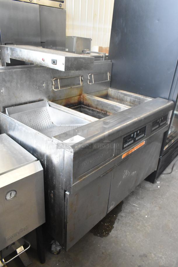 Frymaster FMPH255CSC stainless steel 2-bay deep fat fryer with dumping station, natural gas powered, on casters, 80,000 BTU.