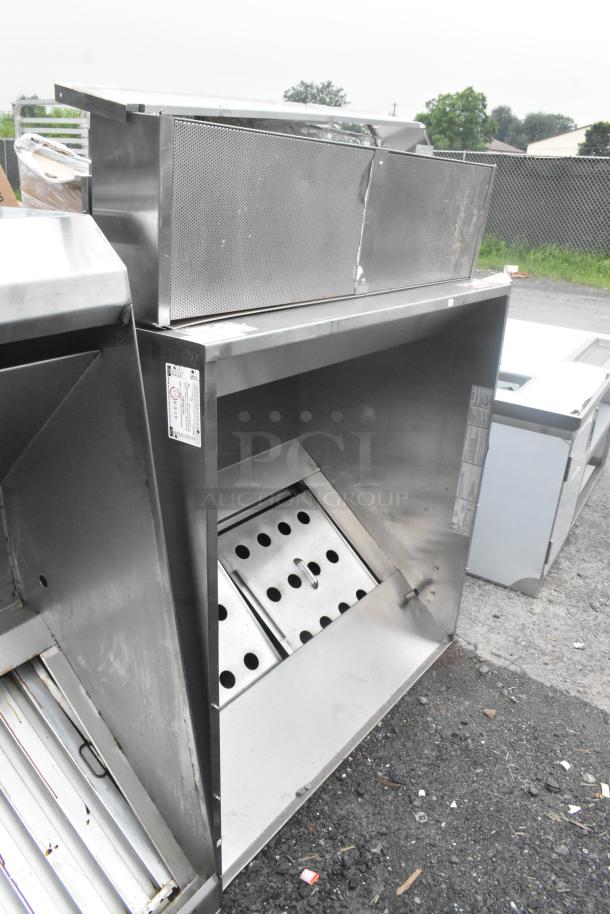 4' CaptiveAire 4830 ND-2 stainless steel grease hood with return air, visible filters, and manufacturer label.