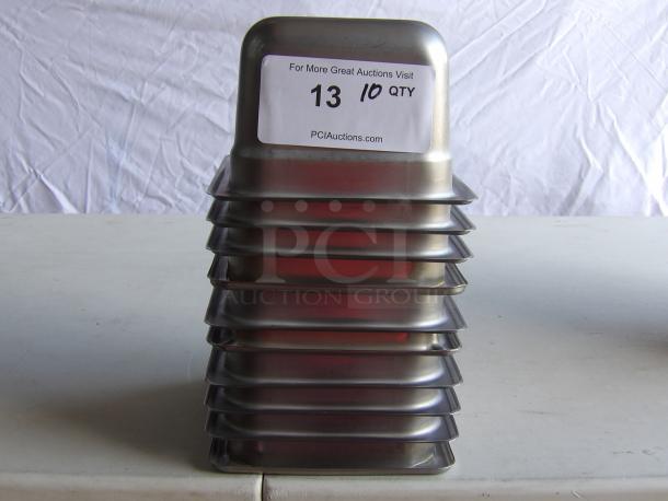 Set of 10 stainless steel steam table pans, stacked. Label indicates lot number "13", quantity "10". Excellent condition.