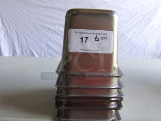 Commercial stainless steel steam table pans, set of 6. High-quality, durable construction, auction label visible, excellent condition.