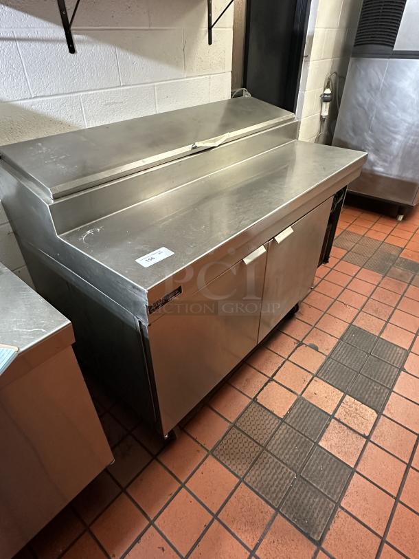 Stanley Knight 2-door SS refrigerated pizza prep table with cold rail, model PRR40VPS, on casters, tested and working.