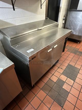 One Stanley Knight 2 Door SS Refrigerated Pizza/Sandwich Prep Table with Top Cold Rail, 2 Racks, On Commercial Casters. Model# PRR40VPS. 115 Volt.  TESTED AND WORKING!!!!! - Item #1196123
