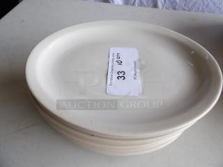 12.5"x8.875" ivory wide rim rolled edge oval stoneware platter, stack of 10, auction label indicates 10 quantity.