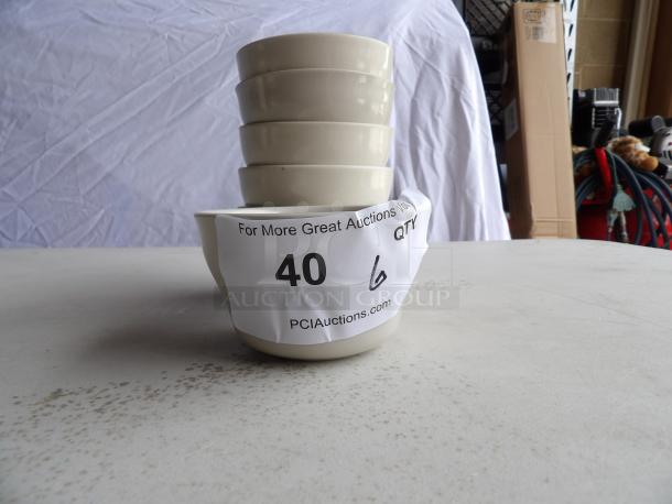 Stack of six 7.25 oz. Ivory Rolled Edge Stoneware Bouillon Cups, American White, with auction label "40 6."