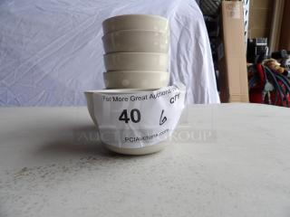 Stack of six 7.25 oz. Ivory Rolled Edge Stoneware Bouillon Cups, American White, with auction label "40 6."