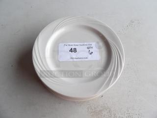 Set of 6 smaller than average white plates with subtle swirl design, labeled "Qty 6". Good condition.