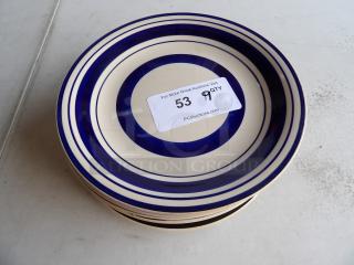 Black, white, and blue plates set, 9 pieces, 9-inch diameter, striped design, with auction label, in excellent condition.