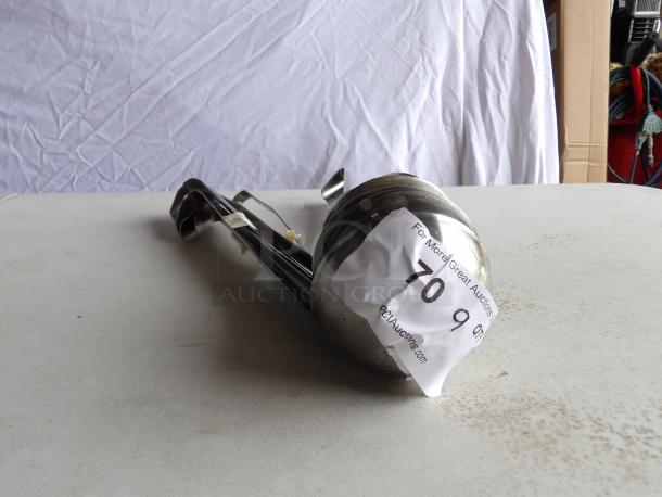 9 stainless steel 8 oz. ladles, one-piece design, good condition, auction tag with number "70 9".
