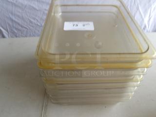 1/2 size clear polycarbonate food pans, 2.5" deep, stack of eight, used condition with label indicating size and material.