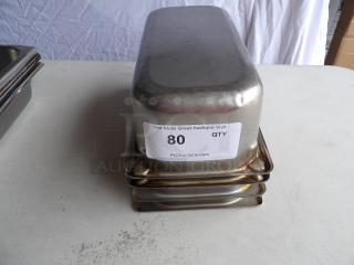 Deep anti-jam stainless steel steam table pan, 12" x 6" x 4". Includes four pans. Auction label visible. 