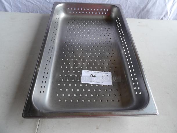 Full-size perforated steel tray pan, excellent condition. Auction tag numbered 94. Perfect for draining or baking.