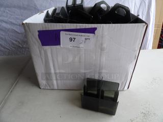 Lot of 28 black plastic jelly packet holders in a box, used, includes some with "SMUCKERS" label.