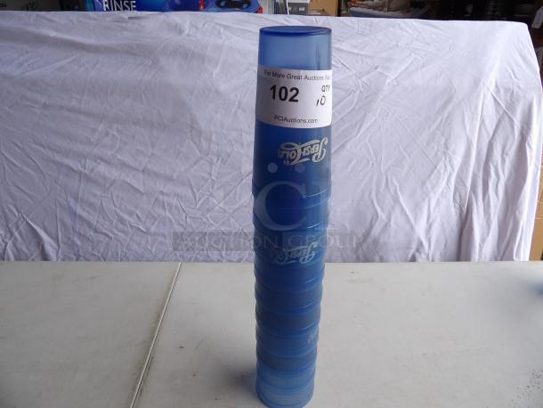 Stack of blue 20 oz Pepsi Cola plastic cups, condition appears new. Auction label reads "Lot 102, QTY 10, PCIAuctions.com".