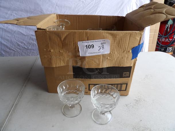Box of 28 Diamond 8 oz. dessert glasses, featuring faceted design. Box slightly worn, glasses appear in good condition.