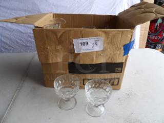 Box of 28 Diamond 8 oz. dessert glasses, featuring faceted design. Box slightly worn, glasses appear in good condition.