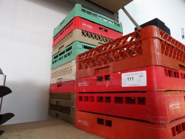 Stacked Carlisle Opticlean full-size combination and flatware racks, various colors, visible label showing auction lot number 111, quantity 12.