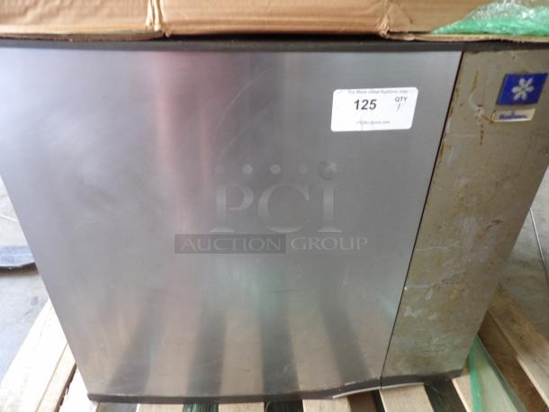Manitowoc Ice Maker Head, Model SY1004A, no bin, no power, 208-230V single phase, stainless steel, moderate wear, auction label visible.