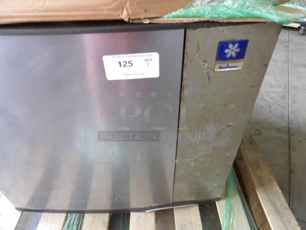Manitowoc Ice Maker Head, Model SY1004A, stainless steel, no bin, no power, visible wear, auction tag with number 125.