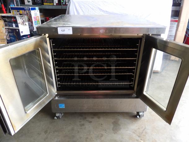 Blodgett Zephaire stainless steel electric convection oven, single stack, wired racks, on casters, used condition.