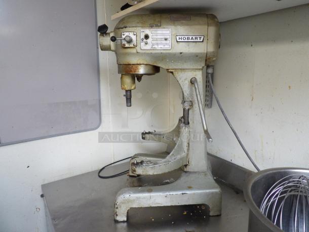 Hobart A-200 commercial mixer, used, with attachments and stainless steel bowl. 115V, 60Hz, 1 phase motor.